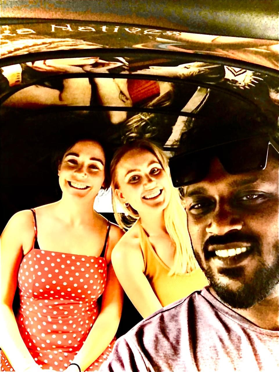 Tourist girls inside decorated tuk tuk - authentic tuk tuk experience Sri Lanka