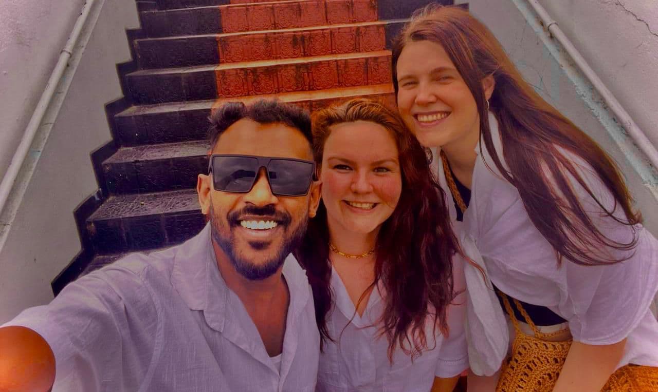Tourists at Temple of the Tooth Kandy with tuk tuk driver - Kandy sightseeing tour