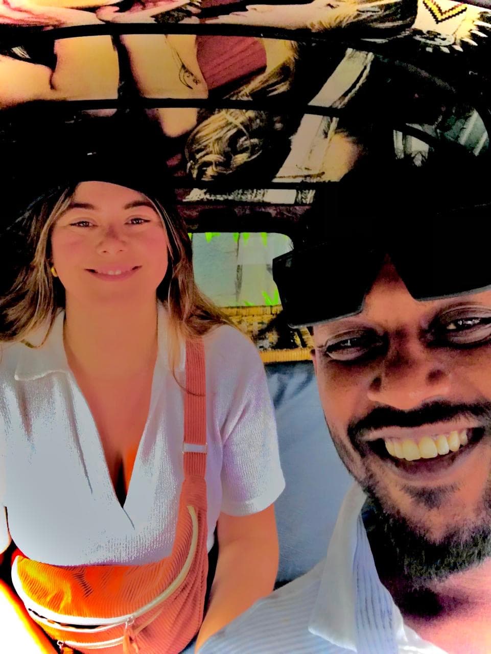 Tourist enjoying scenic tuk tuk ride through Sri Lanka streets