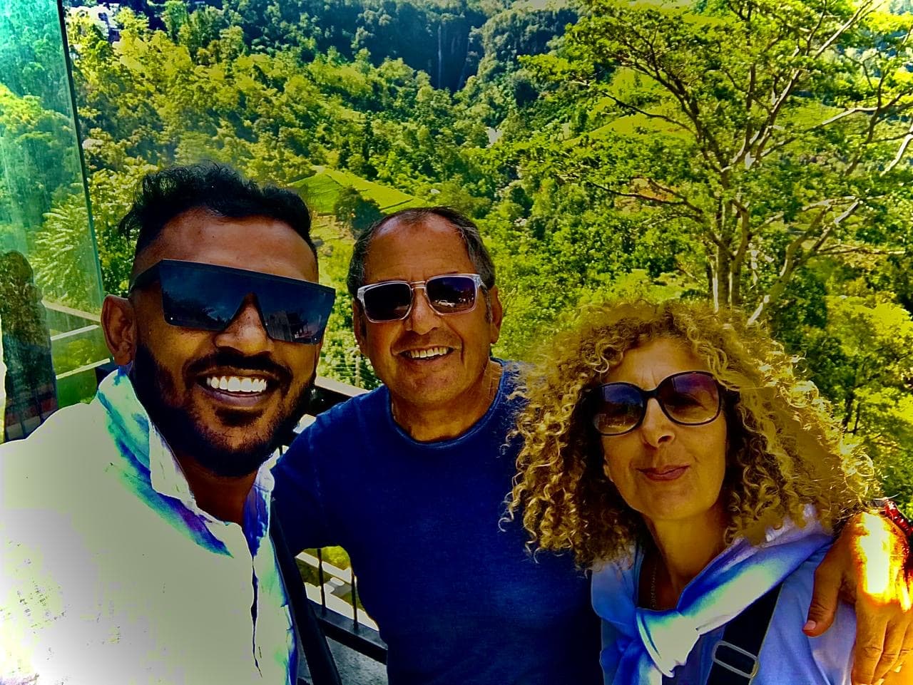 Tourists enjoying tea plantation viewpoint near Nuwara Eliya - Kandy to Nuwara Eliya tuk tuk