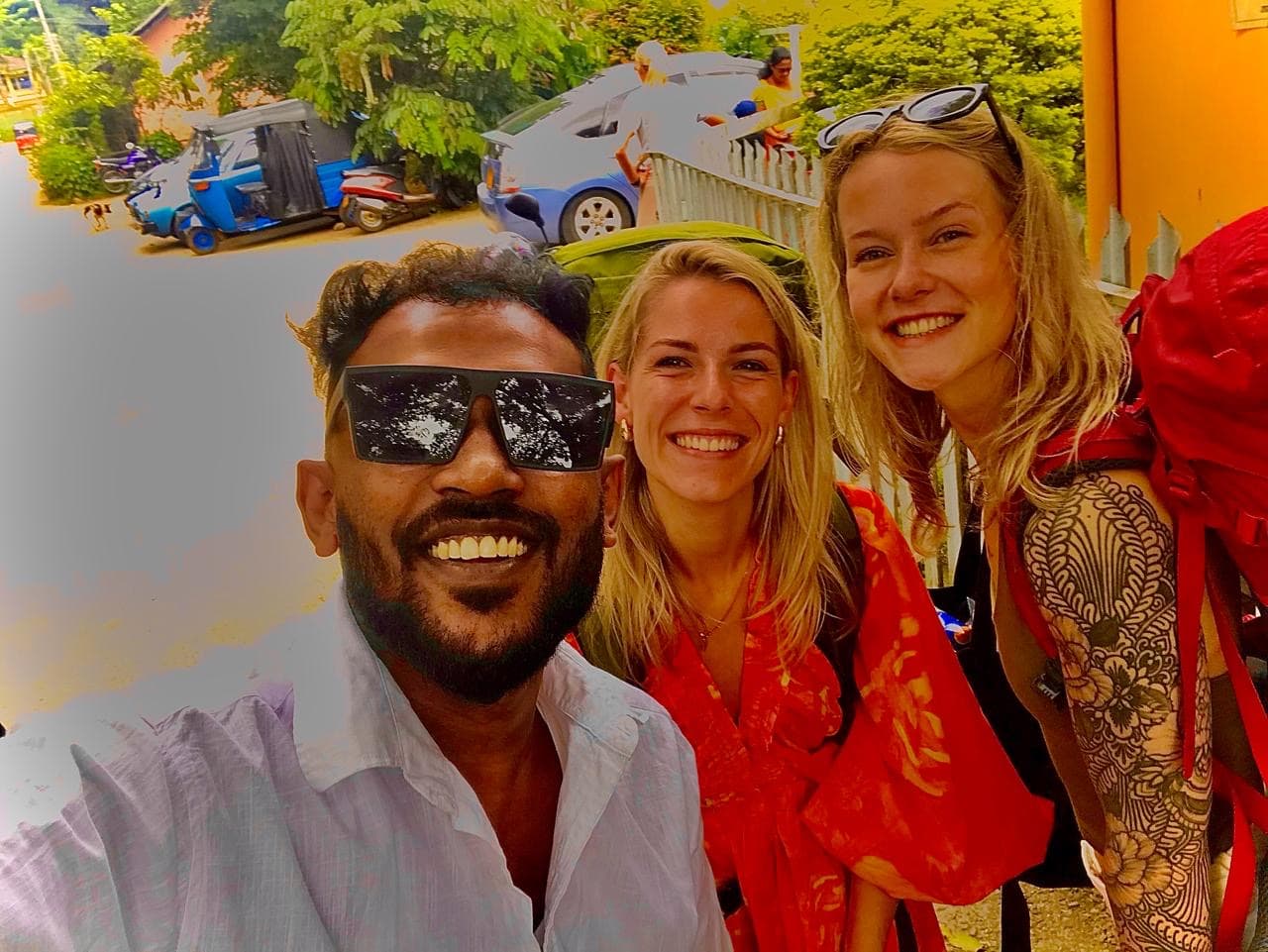 Female backpackers with tuk tuk driver in Kandy - private tuk tuk hire Sri Lanka