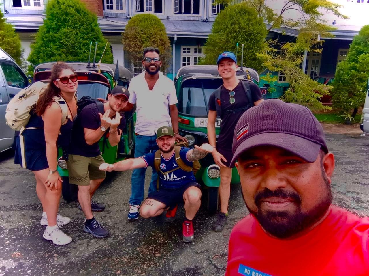 Group of backpackers with tuk tuks in Nuwara Eliya - Sri Lanka tuk tuk adventure tours