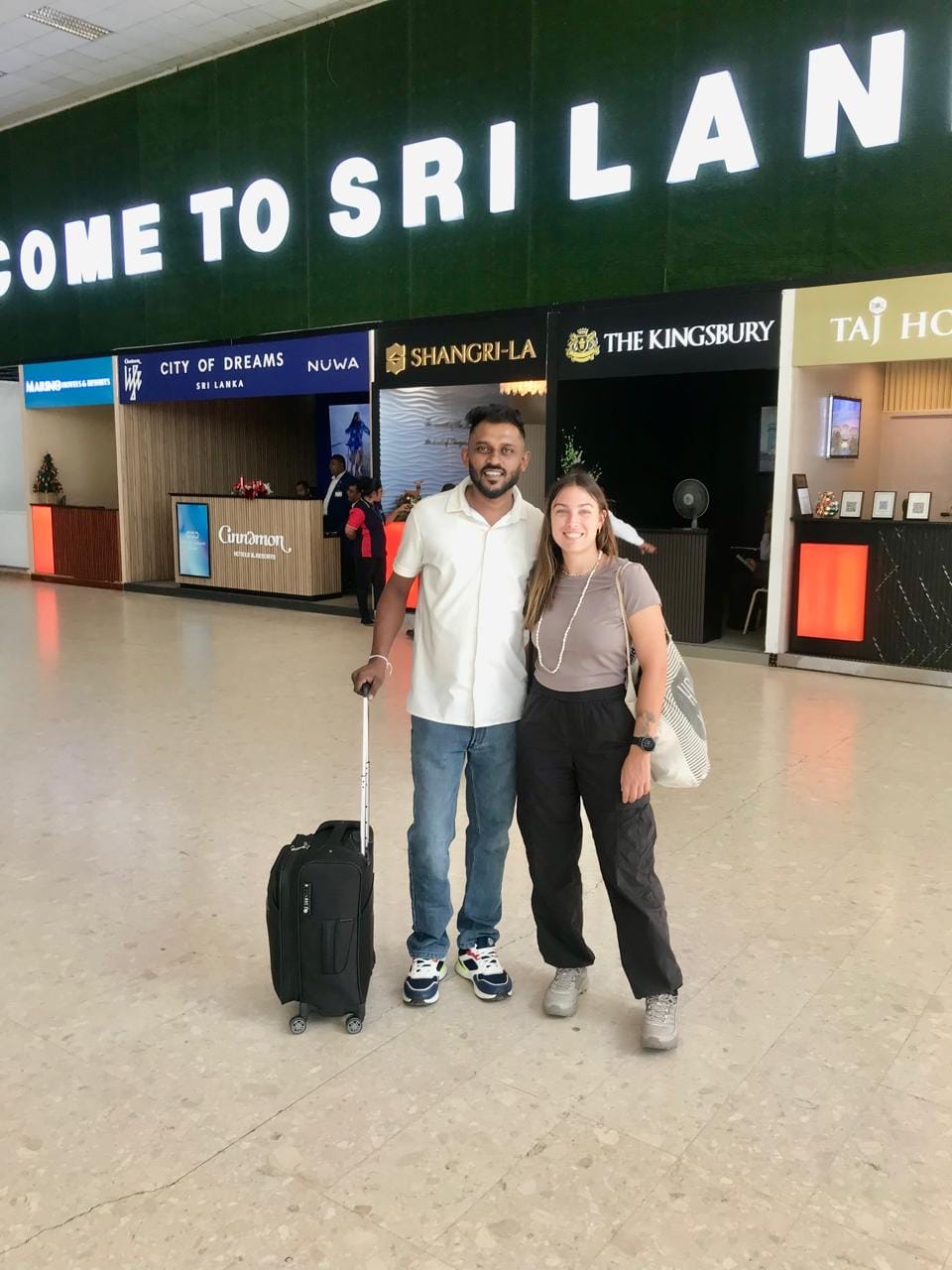 Roshel Subash welcoming a tourist at Bandaranaike International Airport Sri Lanka - private tuk tuk driver